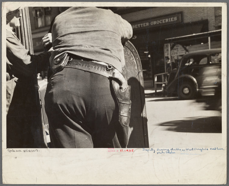 A deputy with a gun on his hip during the September 1935 strike in Morgantown, West Virginia