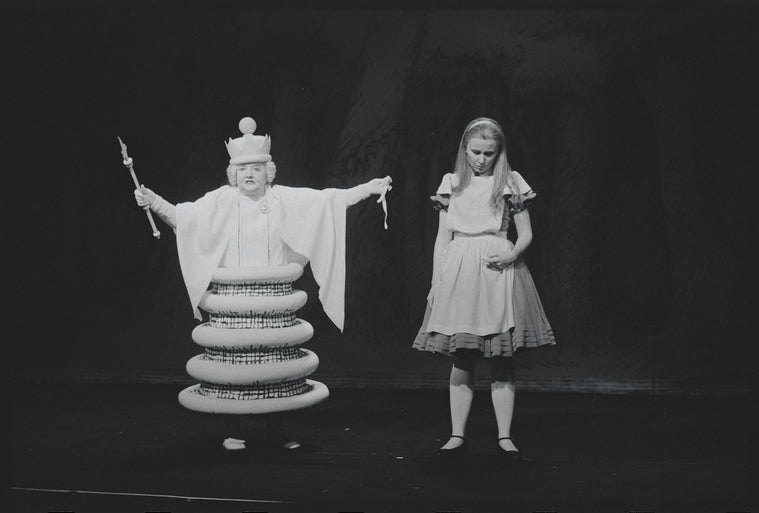 Kate Burton (as Alice) and Joan White (as White Queen) in the stage production Alice in Wonderland