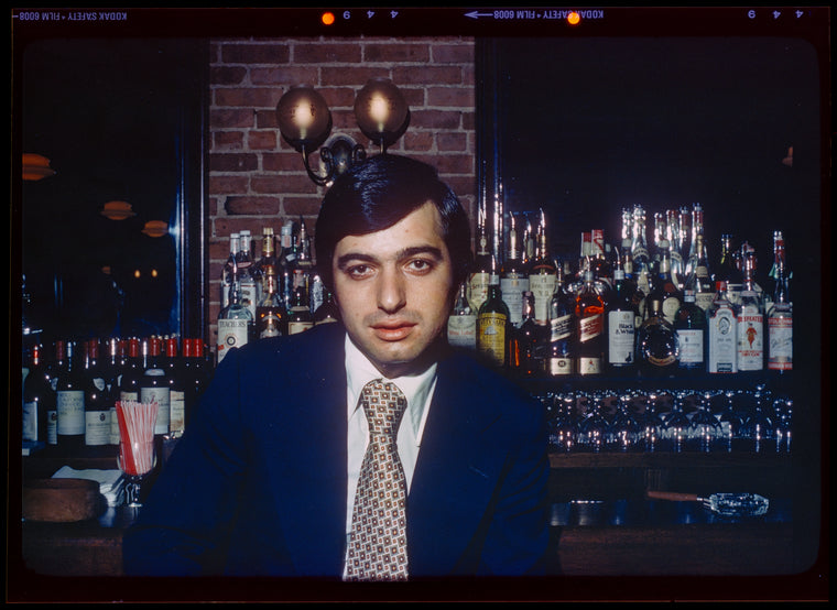 Man seated at bar, 1057 Restaurant