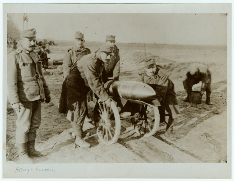 Austrian soldiers wheeling ammunition from the ammunition base to the firing line, Poland