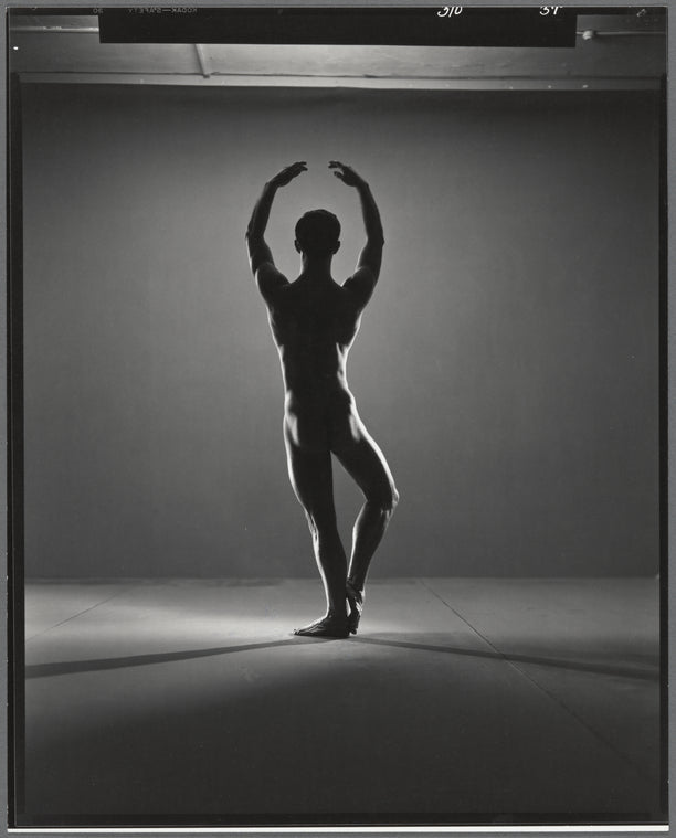 Ralph McWilliams posed with arms in fifth position for New York City Ballet program cover