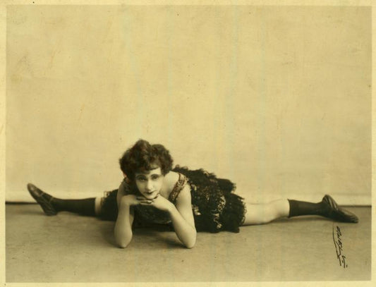 Marie Girard, acrobatic dancer, in a split