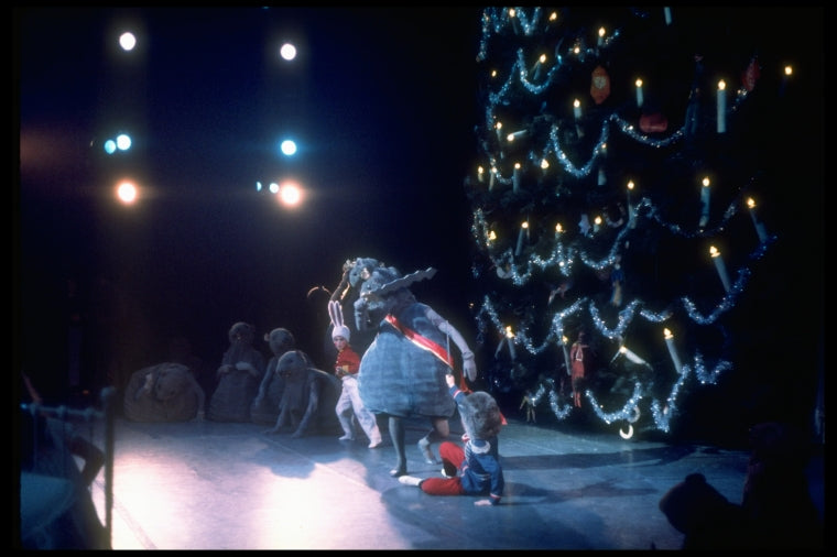 Bunny pulling Mouse King's tail to distract him from the fallen Nutcracker, in a New York City Ballet production of "The Nutcracker" (New York)