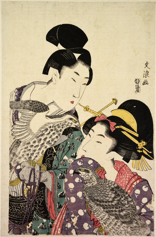 A young man and a girl carrying falcons