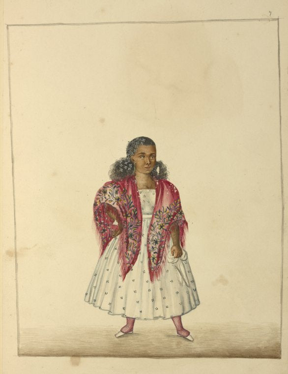 Woman in white dress with small black flowers and floral decorated shawl.