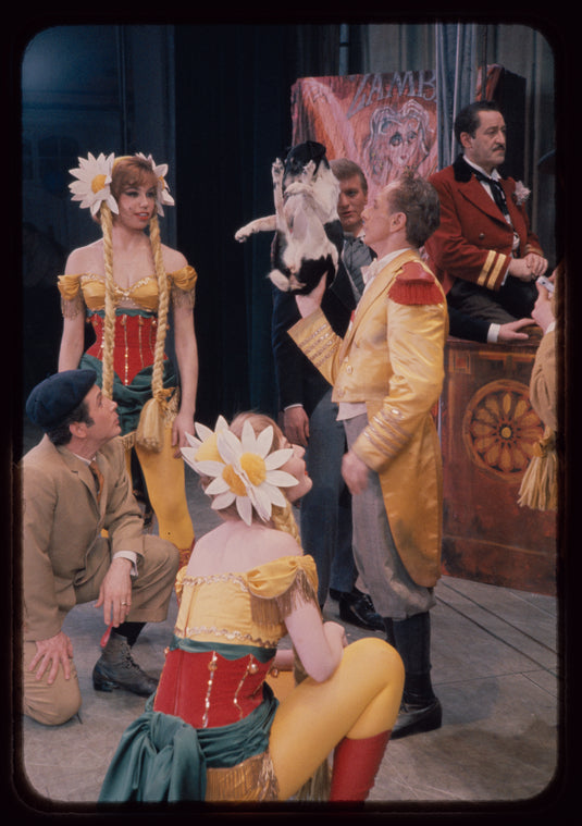 Paul Sydell [center] and unidentified others in the stage production Carnival