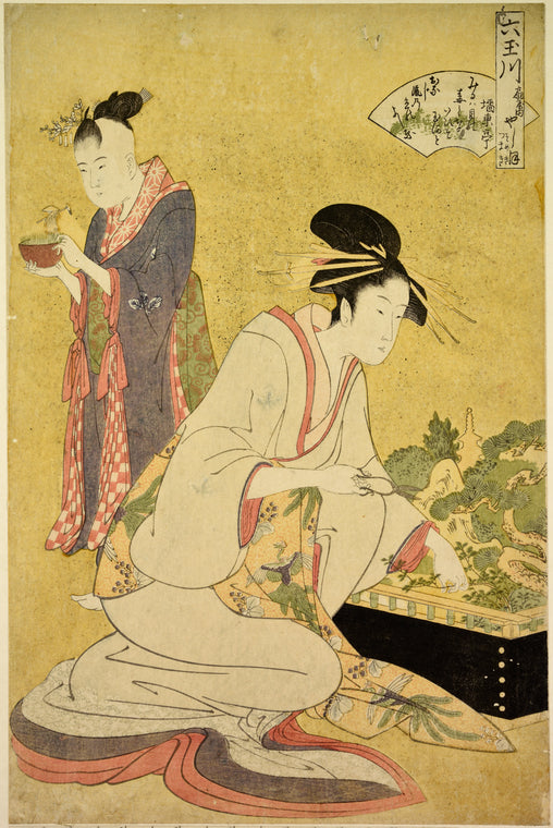 Yashio of Ogiya trimming the plants in a bonsai.  Behind her a girl holding a bonsai representing a farmer in a rice field