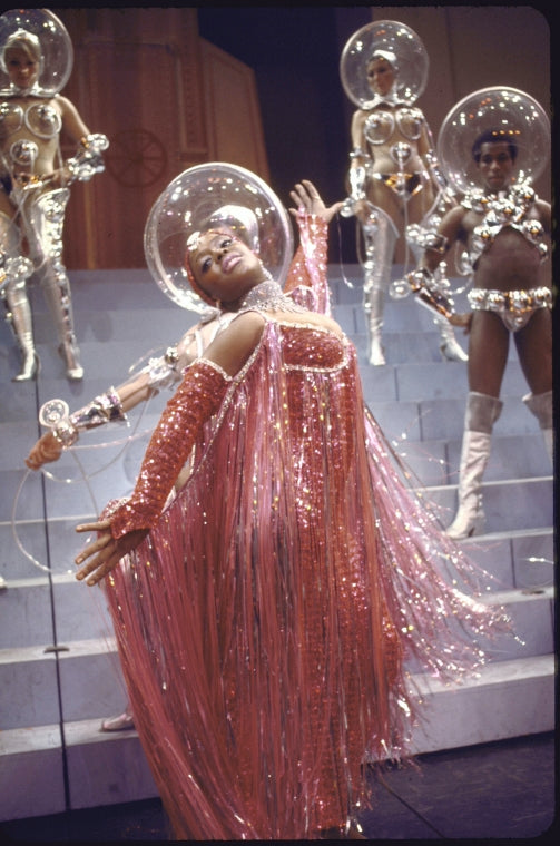 Actress Lurlu Lindsay (C) with cast members in a scene from the Broadway musical "The Selling Of The President" (New York)