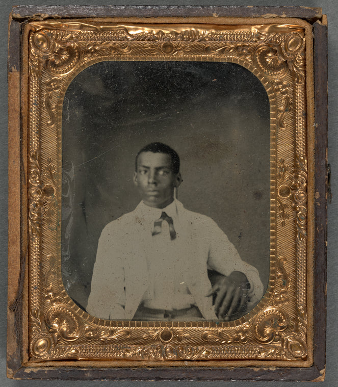 Portrait of Young Man in Coat and Western-Style Tie