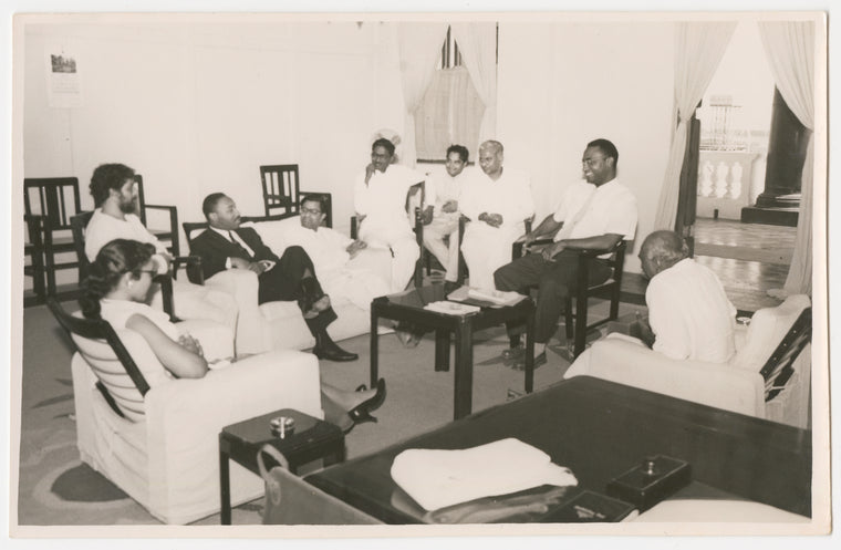 Dr. Martin Luther King, Jr., Coretta Scott King and Dr. Lawrence D. Reddick with an unidentified group during their visit to India