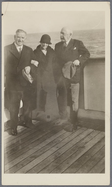 Robert H. Davis and two others on a boat