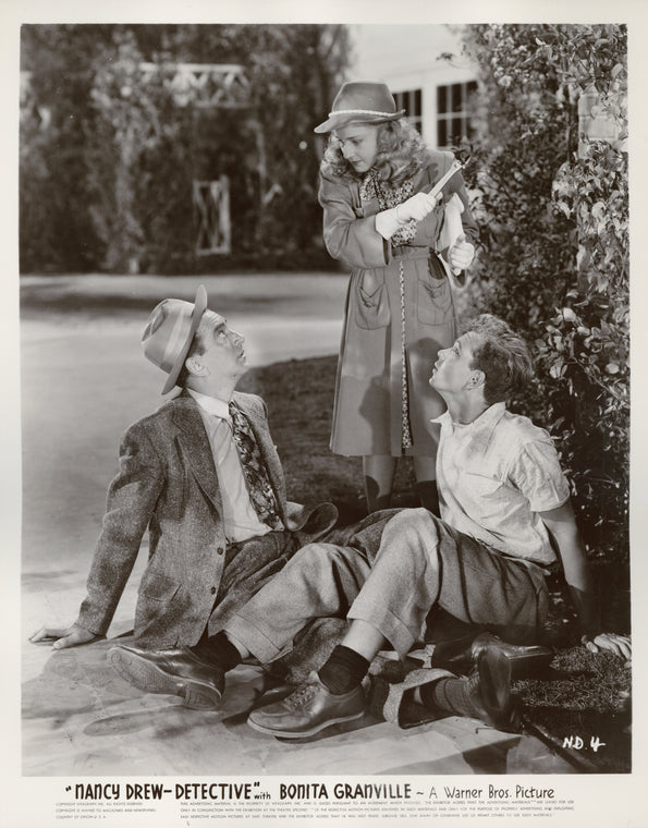 Unidentified actor, Bonita Granville, and Frankie Thomas in the motion picture Nancy Drew: Detective