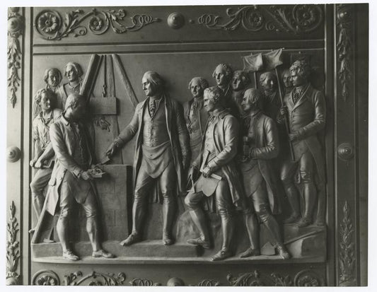 Laying the corner stone of the Capitol, Sept. 3, 1793 - after a panel on one of the bronze doors. Capitol building, Washington, sculptured by Randolph Rogers.