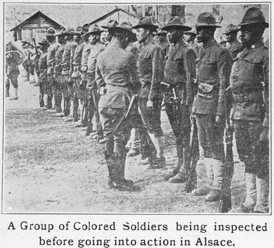 A group of Colored soldiers being inspected before going into action in Alsace.