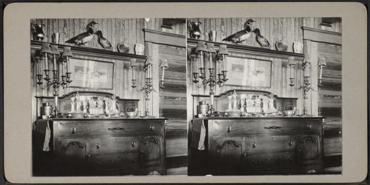 Sideboard with matching candelabras.
