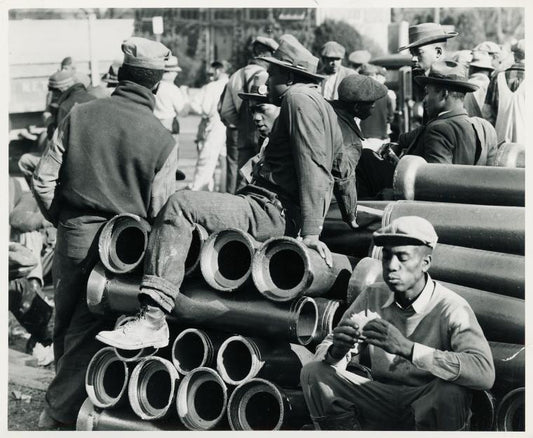 Lunch time on emergency defense office housing construction job; Washington, D. C.; December, 1941.