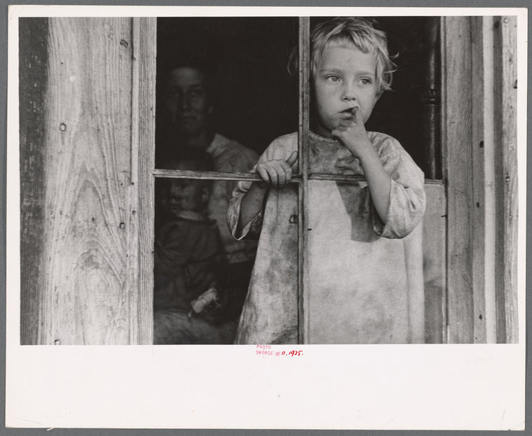 Daughter of sharecropper, Wilmington, North Carolina. Mother and another child in background