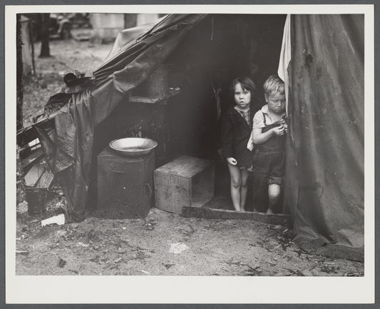 Children in tent home of construction workers. Ten men, two women and two children live here. Near Alexandria, Louisiana.