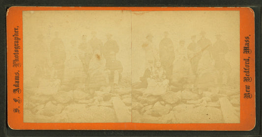 Group on a rocky beach.