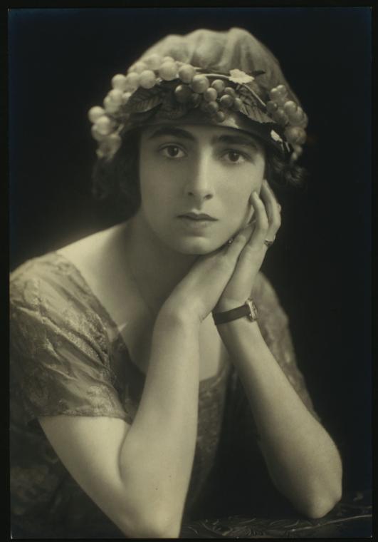 Ruth Page in a hat decorated with grapes