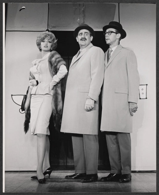 Jeff De Benning [center] and unidentified in the stage production How to Succeed in Buisness