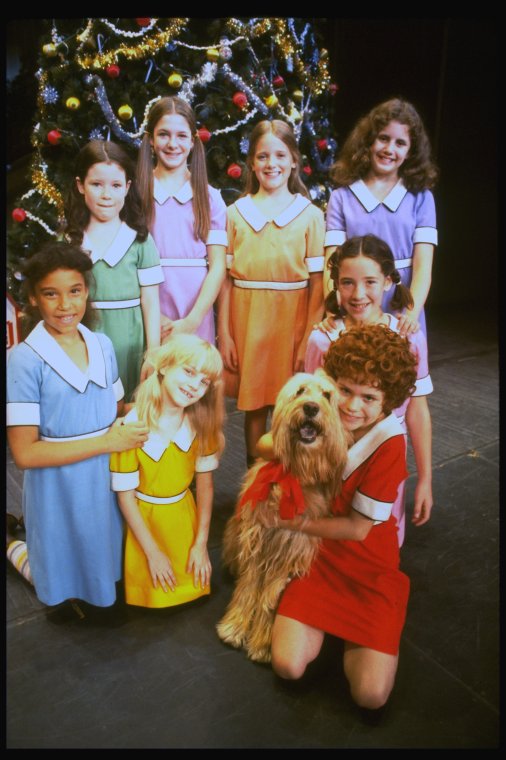 Mary K. Lombardi as Annie w. Sandy (R) and orphans in a scene from the Chicago production of the musical "Annie."