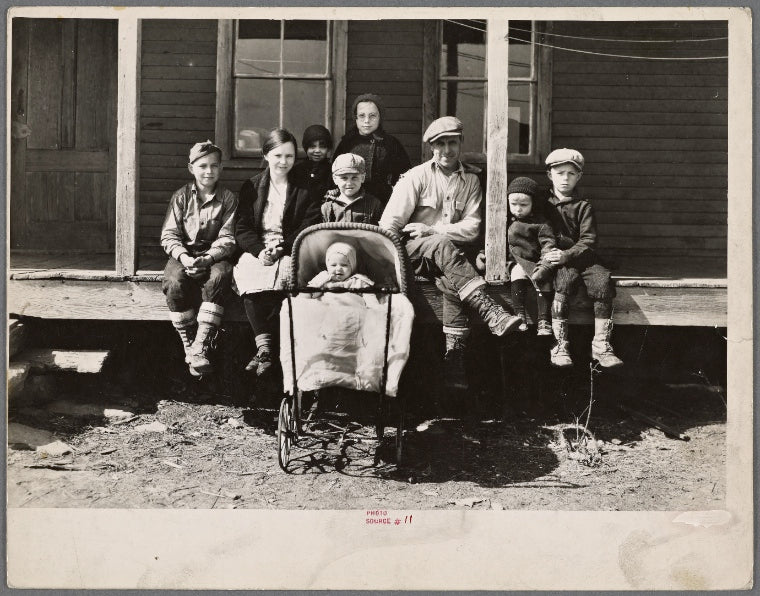 Farmhouse and family of resettlement client. Waldo County, Maine.