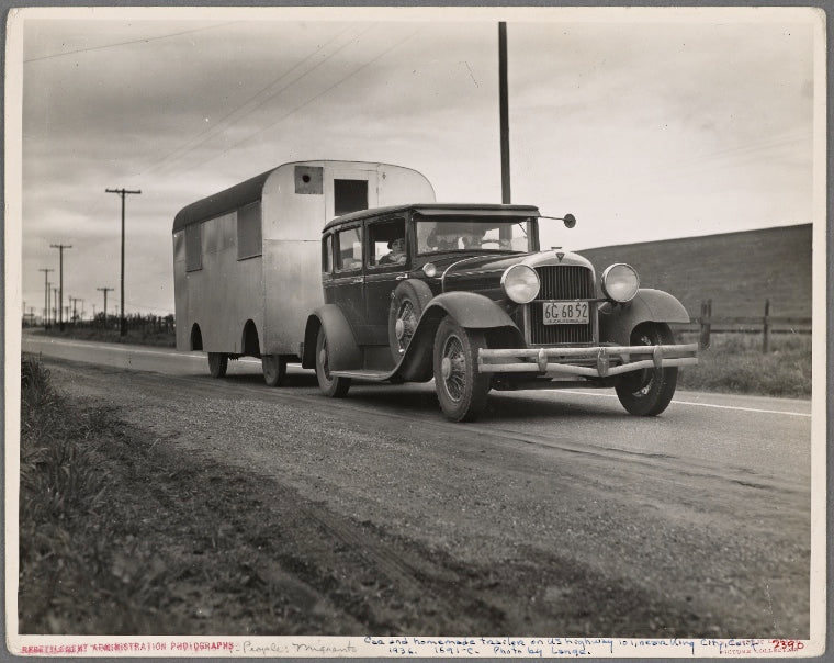 Car and homemade trailer on U.S. 101 near King City, California. Man and wife middle-aged, from Wisconsin. "Old Man Depression sent us out on the road ... You don't know anything about how many people are living in trailers till you 'hit' Florida"