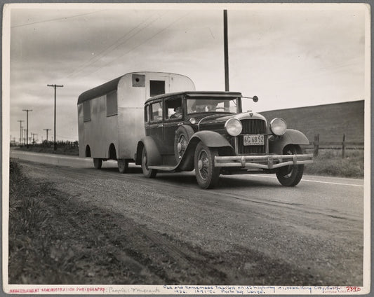 Car and homemade trailer on U.S. 101 near King City, California. Man and wife middle-aged, from Wisconsin. "Old Man Depression sent us out on the road ... You don't know anything about how many people are living in trailers till you 'hit' Florida"