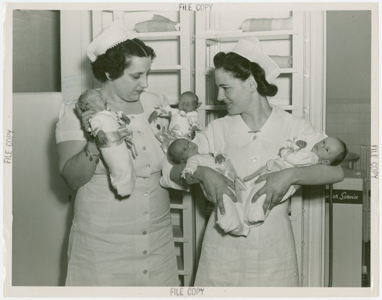Infant Incubator - Hildegarde Couney with other nurses holding three sets of twins