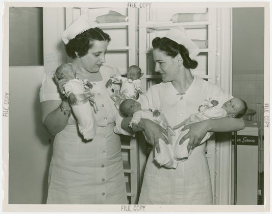 Infant Incubator - Hildegarde Couney with other nurses holding three sets of twins