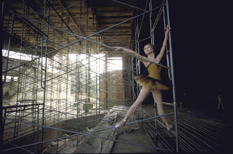 New York City Ballet dancer Violette Verdy poses in front of  the construction of the new Saratoga Performing Arts Center (Saratoga)