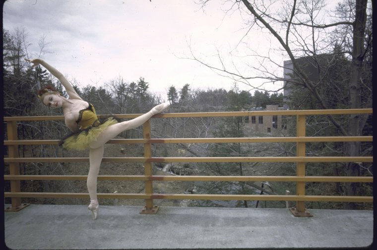 New York City Ballet dancer Violette Verdy poses in front of  the construction of the new Saratoga Performing Arts Center (Saratoga)