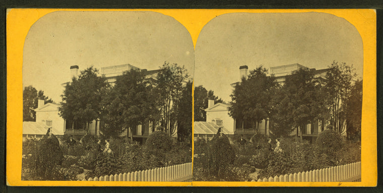 Two women talking in the garden.