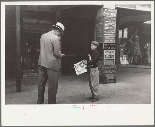 Newsboy on main street, Montrose, Colorado