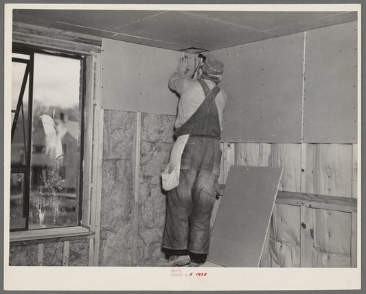 Installing wallboard in a house. Greenhills project, Ohio
