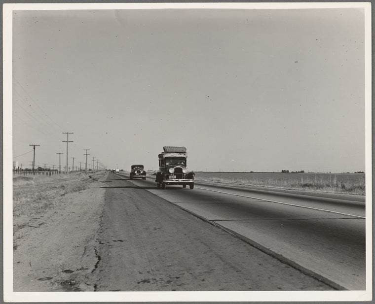 Between Tulare and Fresno. Migrants on the road. California. See general caption