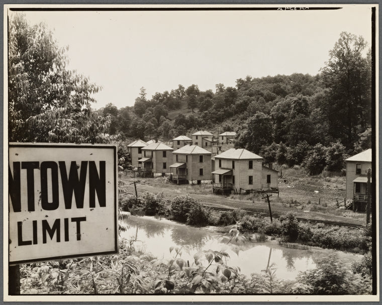 Mining company houses along river. Masontown, West Virginia