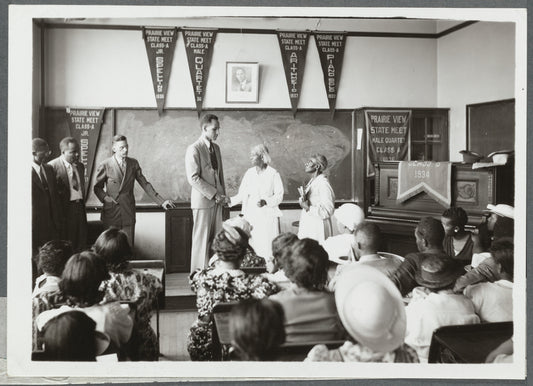O.J. Thomas congratulates the oldest students in the district