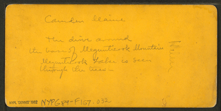 Drive around the base of Megunticook Mountain. Megunticook Lake is seen through the trees. Camden, Maine.