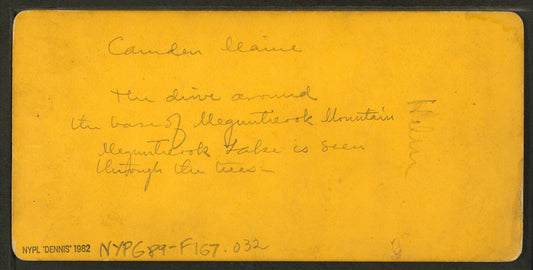 Drive around the base of Megunticook Mountain. Megunticook Lake is seen through the trees. Camden, Maine.