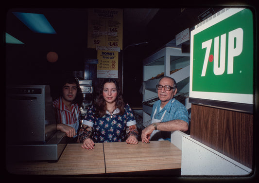 Group portrait at the register, Symposium Restaurant