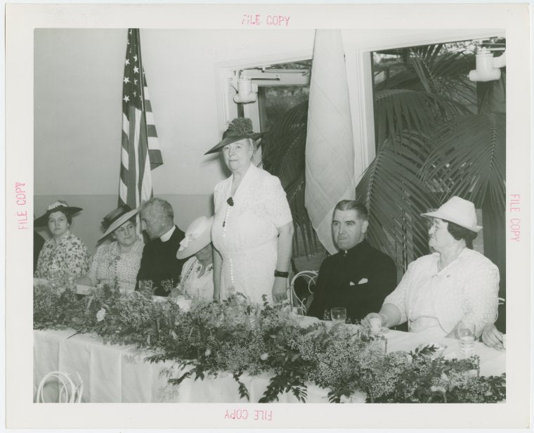 Women's Groups - Men and women at luncheon