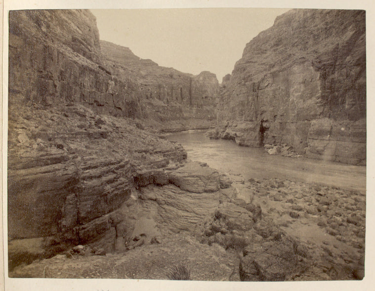 River through canyon with rocks in foreground