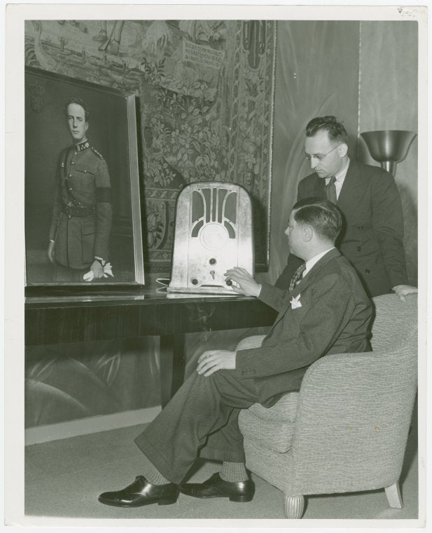 Belgium Participation - Belgian officials listen to news of invasion by radio.