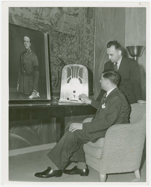 Belgium Participation - Belgian officials listen to news of invasion by radio.