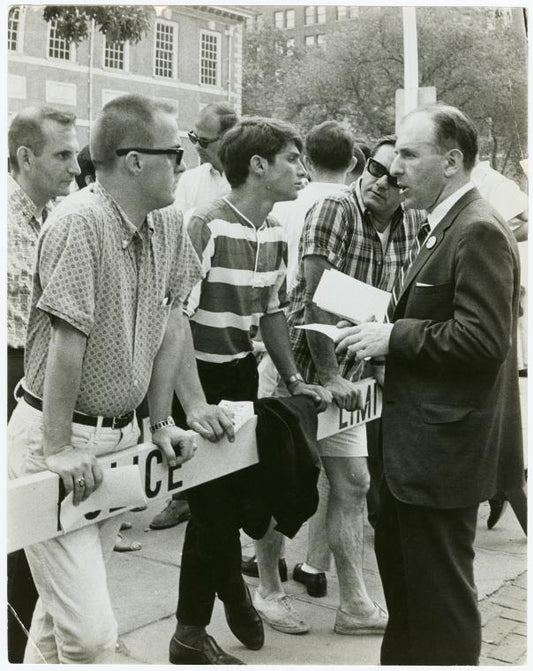 Frank Kameny talking with spectators