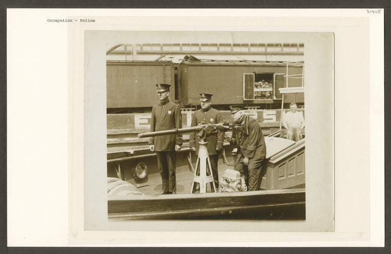 NYPD with rapid fire gun.