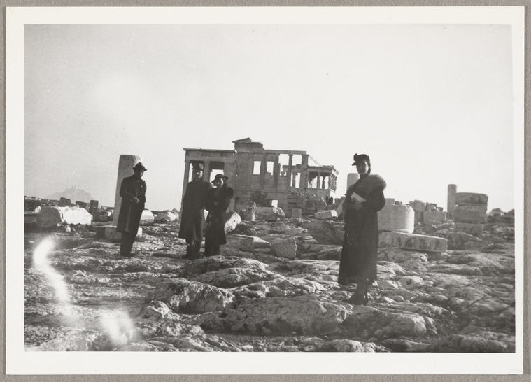 Lisan Kay (right) with tour guide, pianist Hubert Carlin, and Virginia Lee in front of the Temple of Athena