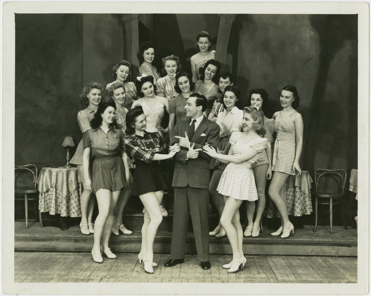 Gene Kelly (Joey Evans) and dancers in Pal Joey